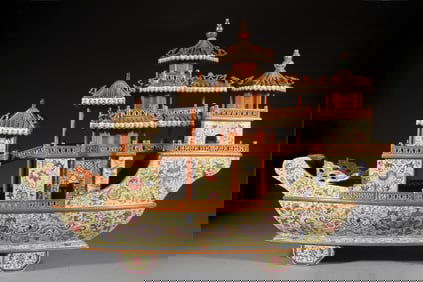 A Qing Dynasty Qianlong enamel colored yellow ground painted with gold and smooth sailing dragon