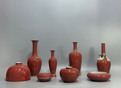 A set of Qing Dynasty Kangxi year cowpea red glazed porcelain