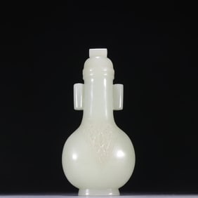 A Qing Dynasty Hetian jade carved poetry inkstone