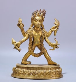 A copper gilt protector of the Qing Dynasty