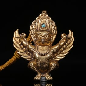 A Qing Dynasty copper gilt golden roc bird pendant