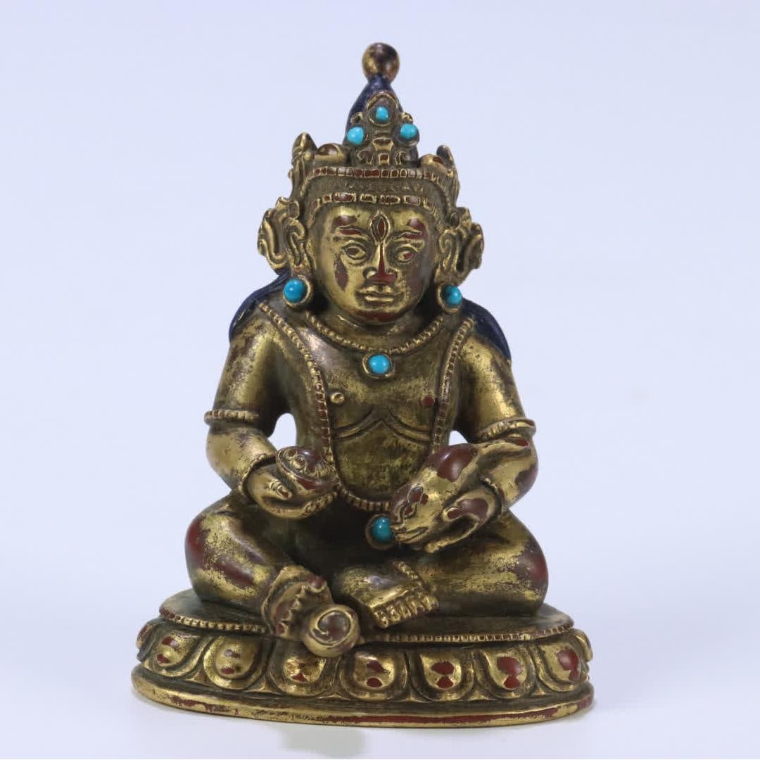 A seated statue of the God of Wealth in bronze gilt in the Qing Dynasty (1 of 12)