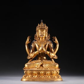 A bronze gilt four-armed Guanyin statue of the Qing Dynasty