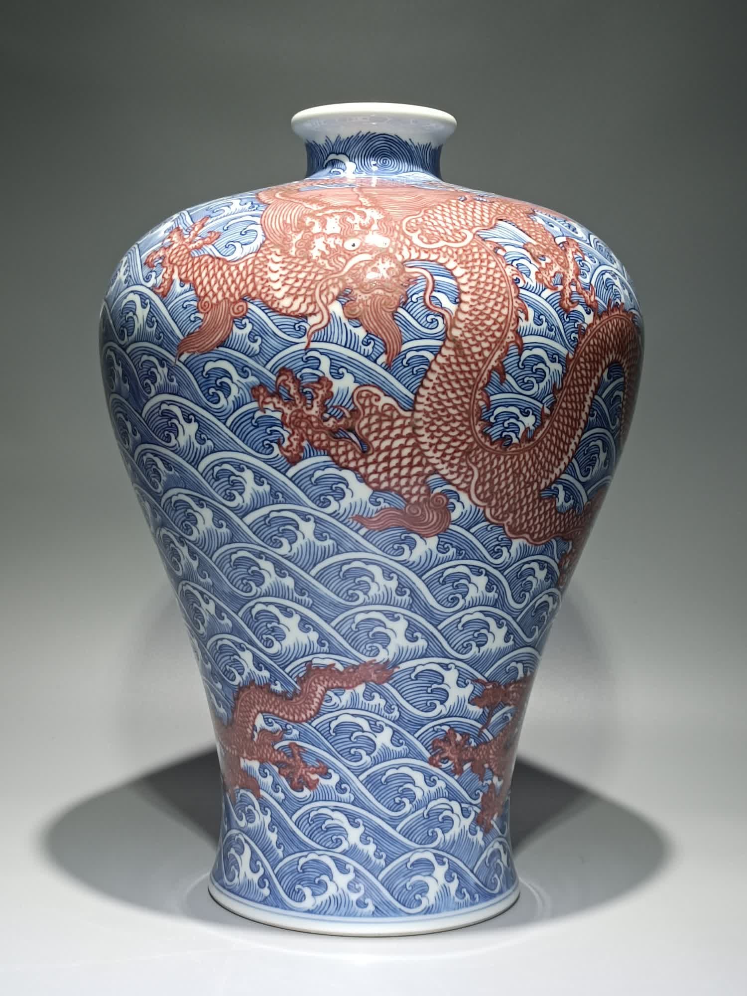 A blue and white glaze made in the Qing Dynasty Yongzheng year red wave cone arch Canglong godson (1 of 9)