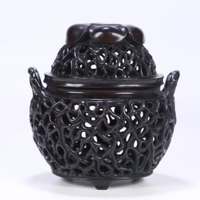 A Qing Dynasty rosewood hollow aromatherapy stove