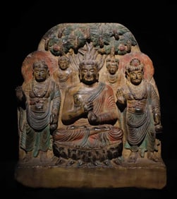 A Gandhara bluestone painted Buddha statue