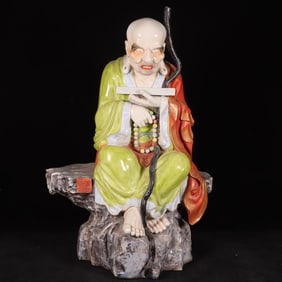 A Qing Dynasty porcelain birthday star ornament