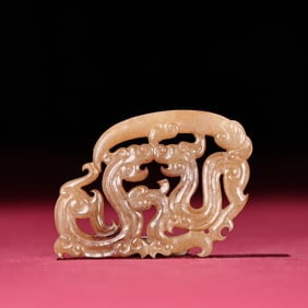A white jade dragon pendant of the Han Dynasty
