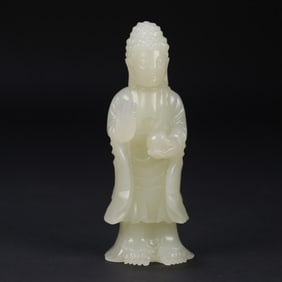 A standing statue of Shakyamuni in Hetian jade in the Qing Dynasty