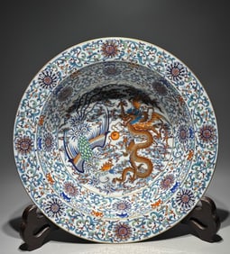 A Qing Dynasty Qianlong model Doucai Fushou Lian consecrated dragon and phoenix auspicious offering