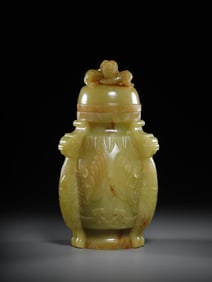 A Qing Dynasty Hetian topaz dragon and phoenix vase