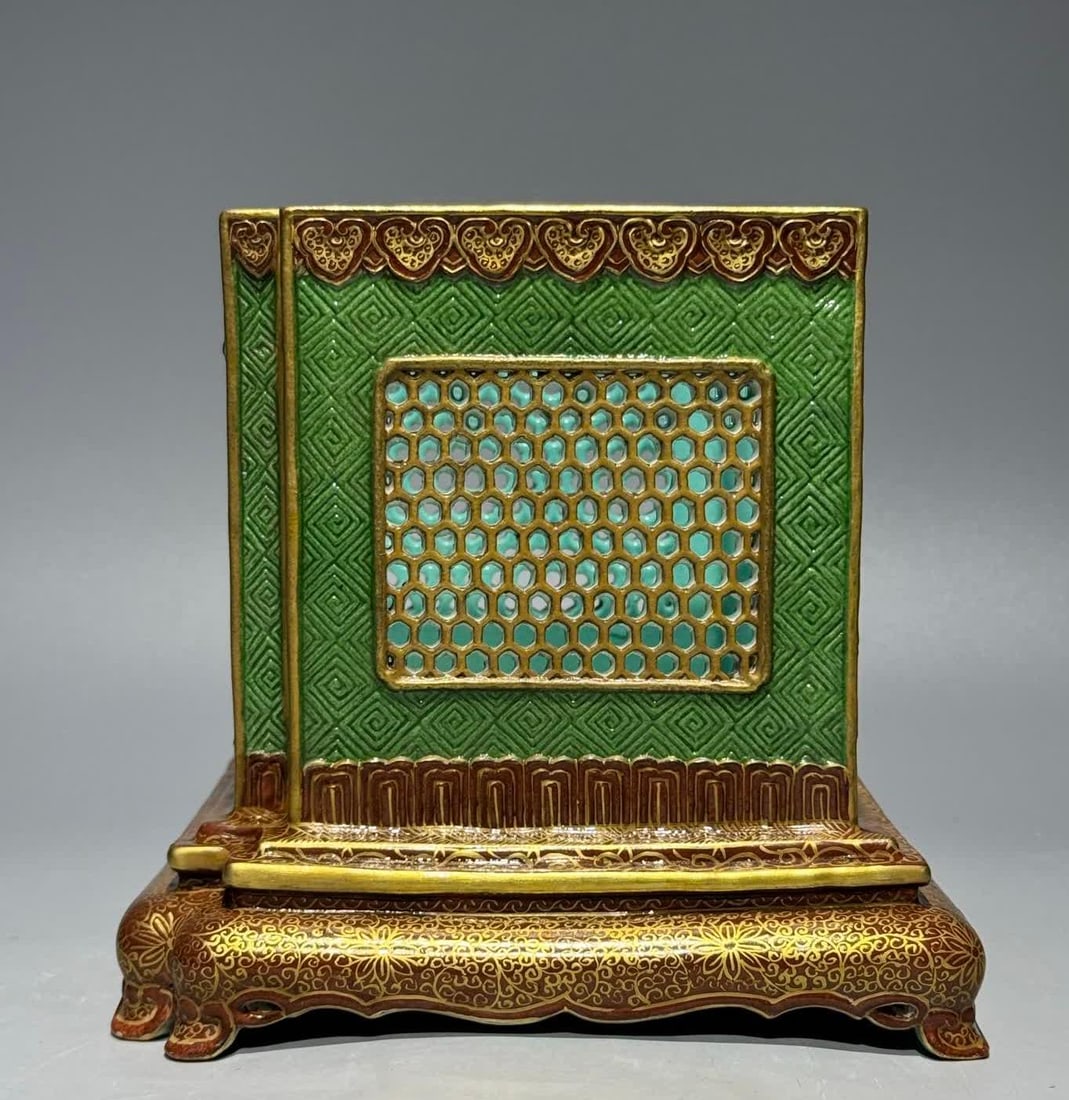 A Qing Dynasty Qianlong enamel green background hollow square pen holder (1 of 9)
