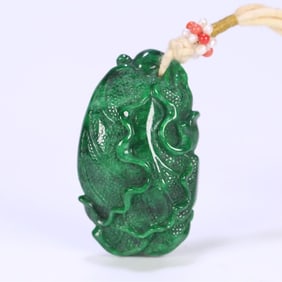 A natural green jade cabbage carving