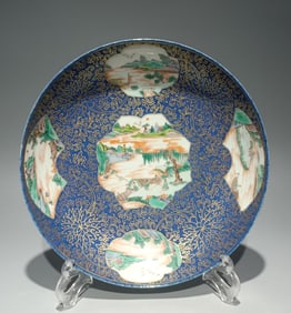 A Qing Dynasty Kangxi snowflake blue window colorful character landscape plate