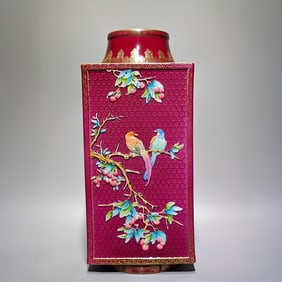A Qing Dynasty Qianlong era enamel carmine red gilded consecrated carved flower and bird brown vase