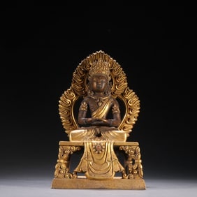 A Qing Dynasty gilded Buddha statue of Infinite Life