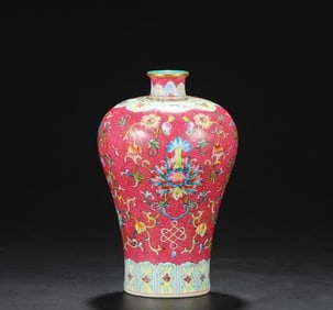 A Qing Dynasty Qianlong pastel flower plum bottle