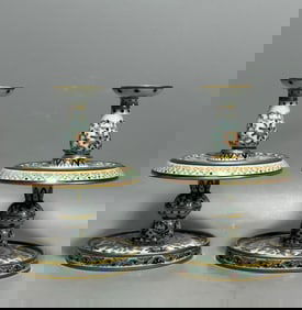 A pair of blue and white candlesticks made in the Qianlong year