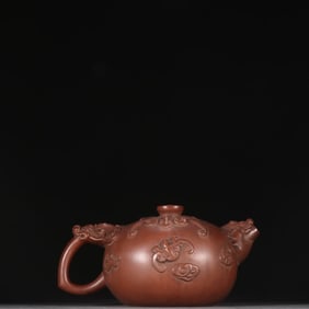 A Jinding trademark purple sand bat pattern teapot