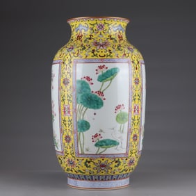 A Qing Dynasty Qianlong pastel gold-painted entwined lotus window four seasons flower vase