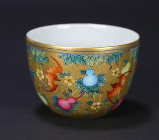 A Qing Dynasty official kiln Yongzheng year made gold ground pastel multi-child Duofu cup