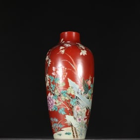 A Qing Dynasty alum red pastel flower and bird pattern plum vase