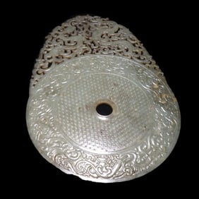 A Han Dynasty Hetian jade dragon and phoenix pattern out of the outline