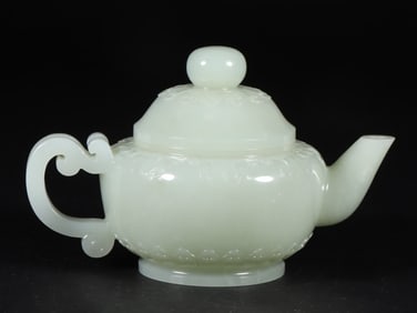 A Qing Dynasty Hetian jade lotus pattern jade pot