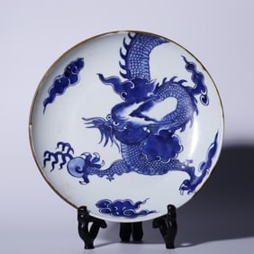 A late Qing Dynasty blue and white dragon spitting bead pattern plate