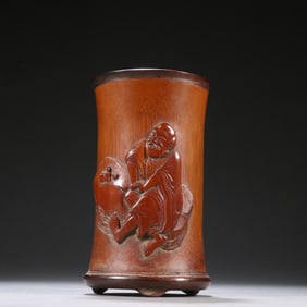 A bamboo carved figure pen holder