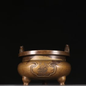 A three-legged incense burner with copper tire braided rope ears