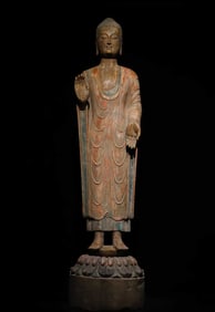 A Qi Qingzhou painted station Buddha
