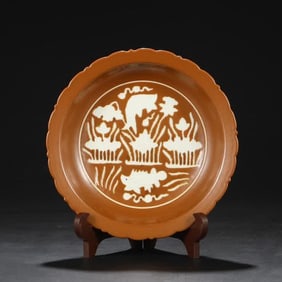 A piece of Ming Dynasty Xuande purple gold glaze left blank and carved fish algae pattern sunflower