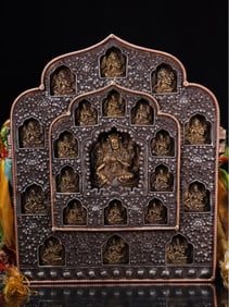 A Qing Dynasty heavenly iron inlaid copper 21 degree Buddha shrine