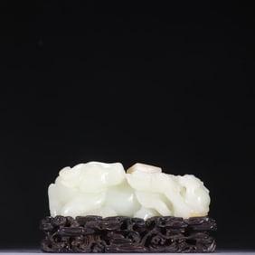 A piece of Hetian jade seed material cow ornament