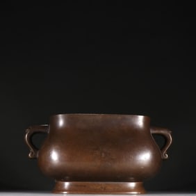 A Ming Dynasty Xuande copper tire worm ear incense burner