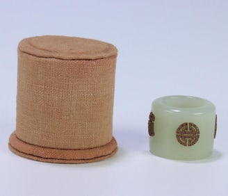 A Qing Dynasty tourmaline auspicious beast button seal