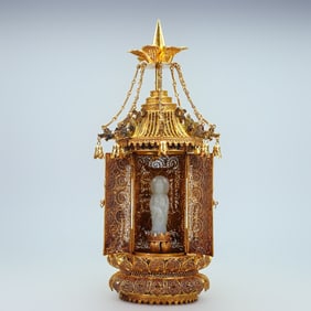 A filigree inlaid Hetian jade Buddha pagoda