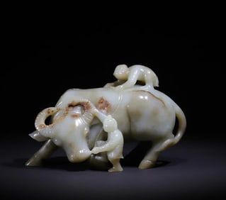 A Qing Dynasty jade carving boy cattle ornament