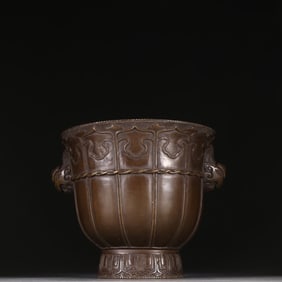 A Ming Dynasty Xuande copper tire cup incense burner