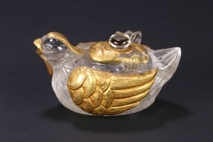 A Liao gold crystal-clad copper gilt mandarin duck pot