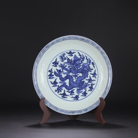 A Ming Dynasty Xuande blue and white cloud dragon pattern plate