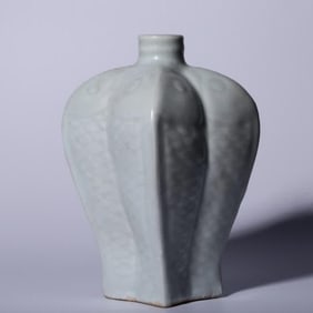 A Hutian kiln shadow celadon glazed four-fish square bottle