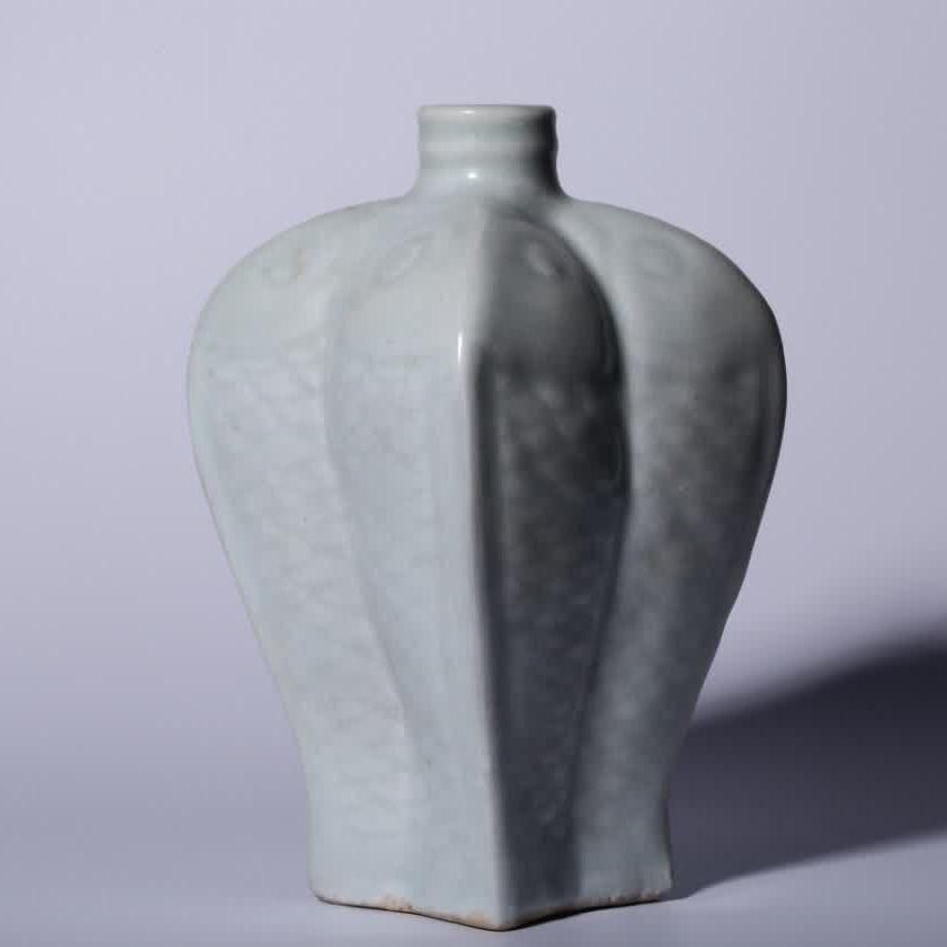A Hutian kiln shadow celadon glazed four-fish square bottle: Hutian kiln shadow celadon four fish square bottle SIZE: H:17.7cm L:9.5cm (The Dimensions Of All Batches Are Manually Measured.If You Need More Detailed Information, Please Contact Our Customer Servic