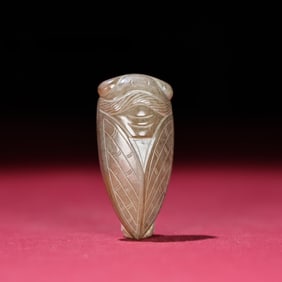 A Han Dynasty jade cicada ornament