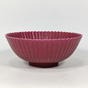 A Qing Dynasty carmine red glazed chrysanthemum petal pattern bowl