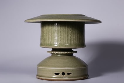 A Yaozhou kiln entwined floral pattern candlestick