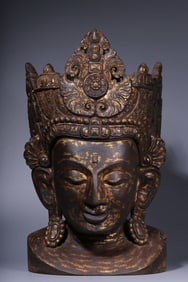 A Qing Dynasty wood carving gilded Guanyin Buddha head
