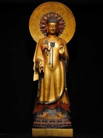 A bluestone gilt painted Buddha of the Northern Qi Dynasty