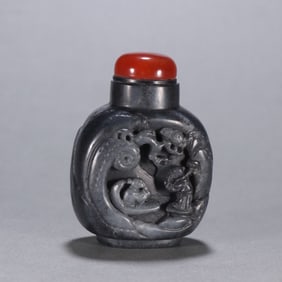 A Qing Dynasty blue and white seed material character story snuff bottle